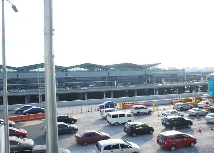 Apartment Palm Tree Across Naia3 By Beth Manila